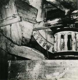 Brake wheel and lantern pinion on stone floor in a toe mill in Föglö, Åland
