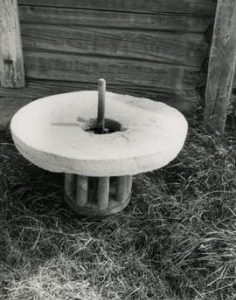 Concave red granite stone on lantern pinion in the magpie mill on Tohna farm in Karhula, Loimaa, Sat