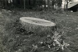 Concave granite millstones at Hauho open-air museum mill in Tammela, Häme