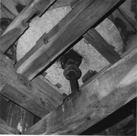 Interior of post mill showing underside of (breast) bedstone