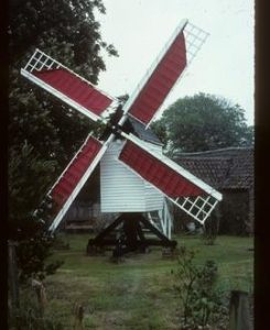 Large working model of open-trestle post mill