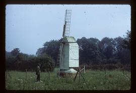F W Gregory inspecting derelict model post mill