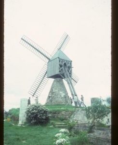 Visitors inspecting restored French "cavier" windmill