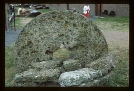 Millstone preserved as monument with "cairn"