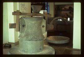 Roman style mill replica in museum