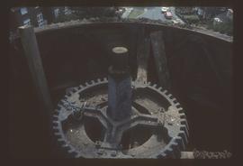 Looking down at wallower of preserved smock mill after removal of cap