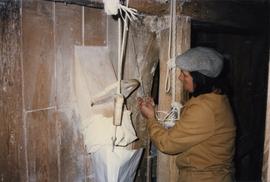 Altering the grain flow using the crook string, Mapledurham Mill, Mapledurham