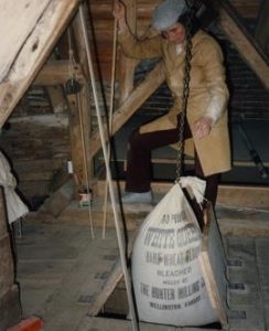 Grain sack coming through trap doors, Mapledurham Mill, Mapledurham