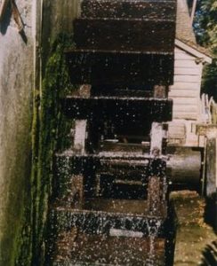 Close up of waterwheel turning, Mapledurham Mill, Mapledurham