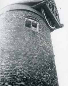 Detail of cap and capwinding wheel