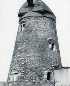 View of derelict mill with cap and no sails