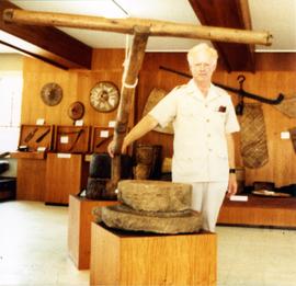 Photograph of Niall Roberts with a t-pole drive to troughed quern, Philippines