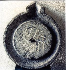Photograph of a quern bedstone, Malaysia