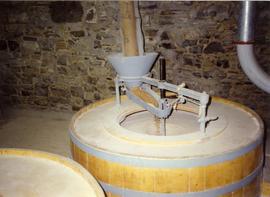 Photograph of the millstones in use, Martry Mill, Meath, Ireland
