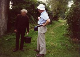 Photograph of Niall Roberts talking to the miller of Cong mill, Mayo, Ireland