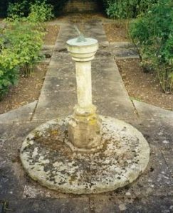 Photograph of a millstone, Clifford Manor garden, Warwickshire