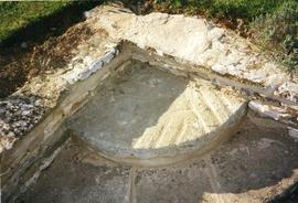 Photograph of a millstone in Abbotswood garden, Gloucestershire