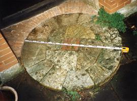 Photograph of a millstone, Goddards, Surrey