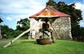 Photograph of a two-roll vertical mill, Maison de la Canne, Trois Ilets, Martinique