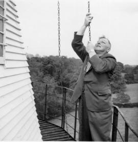 Mr. Bremer closing shutters, Union Mill, Cranbrook