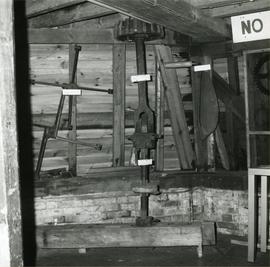 Salvaged millstone gear on ground floor