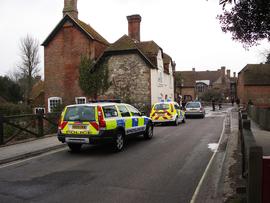 View along lane showing police cordon