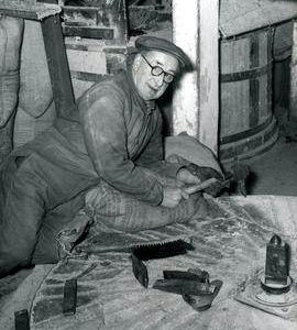Horstead Mill, Norfolk, Jack Drayton dressing the stone