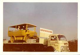 Truck carrying older van