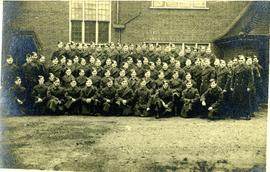 Employees group photograph in their military uniforms