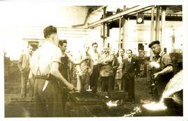 Guests being shown iron working