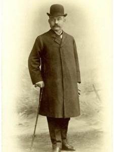 Gentleman posing in smart apparel