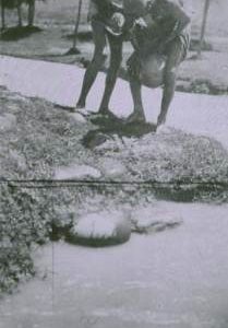 "Paper. Kashmir Squeezing pulp to dry"