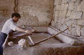 China. Long Zu. Vatman finished dipping mulberry.