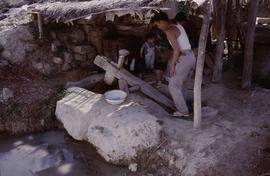 China. Long Zu. Man stamping.