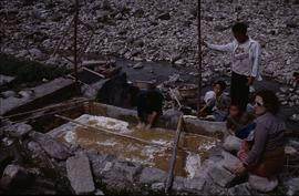 China - Kaili. Ping Liang. Vat being filled.
