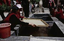 Dege Papermaking Mould lifted out of vat.
