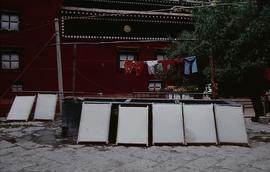 Dege Papermaking. Row of moulds drying.