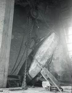 "Bradwell, Bucks - windmill interior with millstone and lifting tackle"