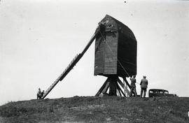 Taking sail and stock down, Brill Windmill