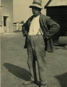 Mr Woods in his yard, Cranley Green Mill, Eye
