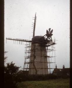 House conversion, scaffolded for repairs, with damaged sails, Waterhall Mill, Patcham