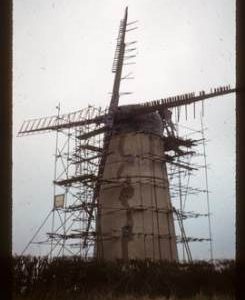House conversion, scaffolded for repairs, with damaged sails, Waterhall Mill, Patcham