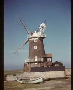 House conversion with sails, tower mill, Cley next the Sea