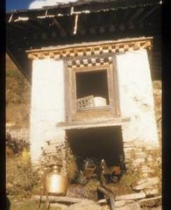 Small watermill building with horizontal wheel