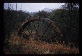 Exterior view of stand-alone iron waterwheel