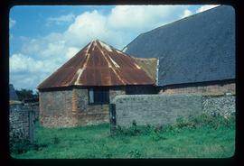 Unidentified building on farm with octagonal brick structure (horse mill?) Built on