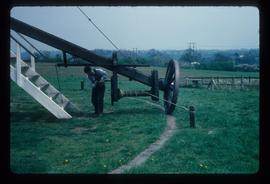 James Waterfield turning winch on tailpole to wind preserved post mill