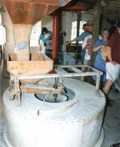 Millstone andpeople, watermill, Layham