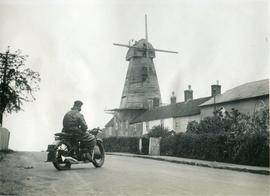 Staplecross Mill, Ewhurst, with houses and motorbike