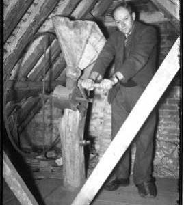 Interior view of water mill with miller